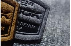 China 3D Snow Suit Micro Fiber Woven Clothing Labels Embossed Patches supplier