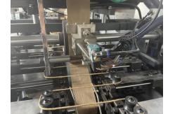 China Automatic Hot Melt Glue Paper Shopping Bag Handle Making Machine 380V supplier