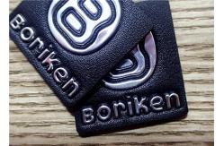 China Black Embossed Leather Patches With Silver Embossment TPU Logo For Bags supplier