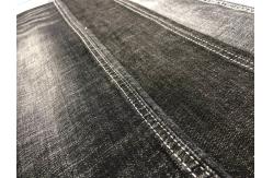 China Stone Washed Super Stretch Cotton Dualfx T400 Lycra Denim Jeans Fabric Sulfur Black supplier