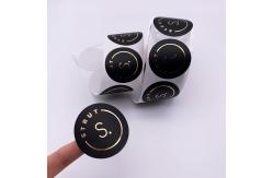 China Black Round Matte Black Paper Sticker Labels With Gold Logo supplier