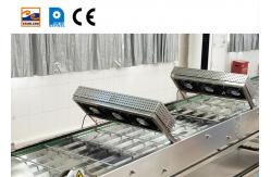 China Stainless Steel Cone Industrial Line Accessories Marshalling Cooling Conveyor supplier