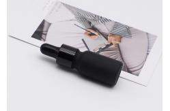 China Frosted Black Essential Oil Bottles 50ml Cylinder Package Screen Printing supplier