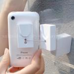 SECURITY RECOILING TETHER FOR MOBILE PHONE OR SHAVER RETAIL DISPLAY