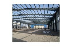 China Customizable Versatile Steel Frame Warehouse Construction With Sandwich Panel Roof Cladding supplier