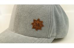 China Bsci Polyester Plush 6 Panel Baseball Cap With Leather Patch Custom Logo supplier