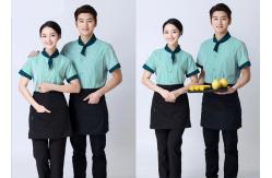 China Embroidered Unique Restaurant Uniforms With Single Row Transparent Resin Buttons supplier