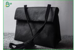 China Virgin And Natural Fabric Material Kraft Liner Paper For Handbags And Jeans supplier