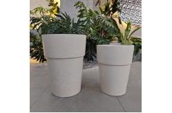 China Cream Composite Clay Flower Pot with Smooth Hand Carved Design supplier