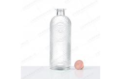 China Exquisite Carved Exterior Glass Bottle with Customizable Logo and Transparent Design supplier