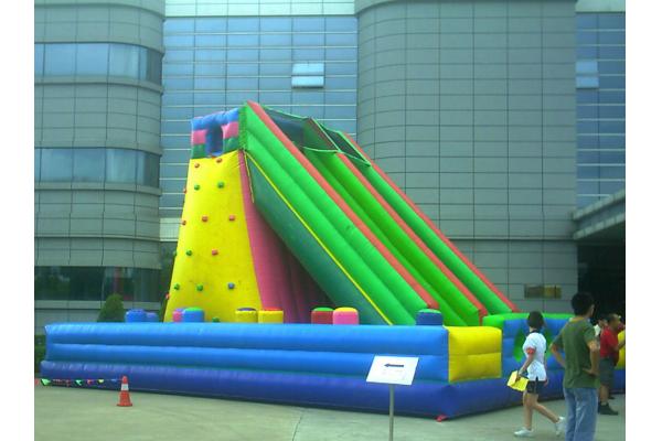 Green Rock Climbing Wall With Slide And Pool , Inflatable Amusement Park