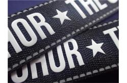 China Symphony Printing Eco - Friendly Silicone Logo Patch Fade Resistance Strong Stretch supplier
