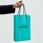 Customized High-end Hand held Gift Bags Clothing Store Personalized Craft Kraft Paper Bags Gift Packaging for sale