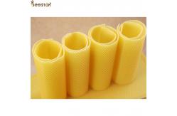 China Customized Cell Size Pure Natural Beeswax Grade D Confectionary Industries supplier