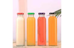 China Empty Round Glass Juice Bottles , Portable Raindrop Flavored Water Bottle supplier