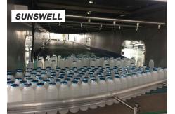 China Capacity 2000bph HDPE Bottle Filling Machine For Tea Drinks And Fruit Juice supplier