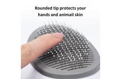 China Blue Self Cleaning Dog Brush Dog Hair Deshedder With Massage Function supplier
