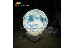 China Ethereal Lunar Sculpture: Crater-Textured Moon Statue In Dreamy Blue Gradient​ supplier