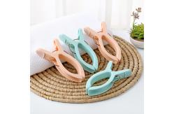 China 4 Pcs 1 Set Spring Peg Beach Towel Quilt Plastic Clothes Hanger Clips supplier
