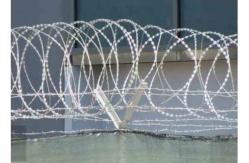 China Cbt 65 Electric Galvanized Razor Barbed Wire With High Security Protection supplier