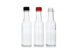 China 100Ml 150Ml Round Shape Tomato Hot Sauce Glass Soy Sauce Bottle supplier