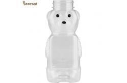 China Wholesale High Quality 300g Honey Jar And Spoon Plastic Empty Honey Bear Bottles supplier