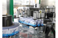 China Full Automatic Rotary Wrap Around OPP Labeller Hot Melt Glue Labeling Machine supplier
