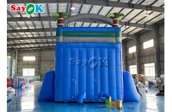 China Bouncy Slides Custom Backyard Palm Tree Themed Inflatable Water Slide With Splash Pool supplier