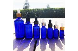 China Matt Blue Essential Oil Empty Glass Bottle Reusable And Recyclable supplier