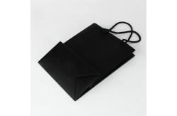 China Paperboard Black Custom Paper Shopping Bag With Soft Handle supplier