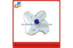 China Flower lapel pin badge custom,gold plated white logo custom metal lapel pin supplier