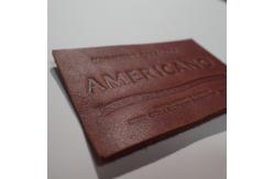 China Hot Stamping Genuine Leather Patches Embossed Custom Logo Washable supplier