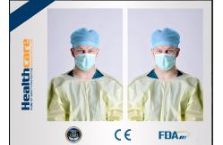 China Yellow Disposable Isolation Gowns One Time Use Knitted Cuff Barrier Gowns Against Liquid supplier