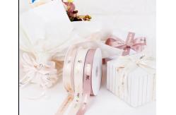 China Custom Logo Printed Satin Gift Wrap Ribbon with Polyester Decoration supplier