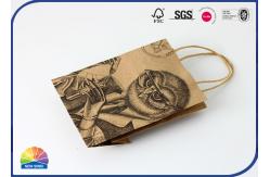 China Stand Up Packaging Kraft Paper Bags Black Printing With Handles supplier