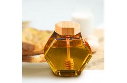 China Wholesale Free Sample Hexagonal 220ml 380ml Honey Jar with Dipper and Wooden Lid supplier