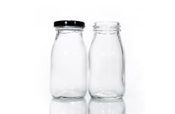 China Eco Friendly Frosted Bulk Glass Milk Bottles 16 Oz Kombucha Bottles With Lid supplier