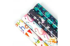 China Flamingos And Dinosaurs Gold Gift Wrap Paper Roll Cartoon Design For Kids supplier