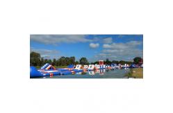 China 1500D Waterproof 250 People Inflatable Wipeout Course With TUV Certificate supplier