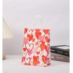 Red 80gsm Kraft Paper Gift Bags Love Heart Printed Paper Goodie Bags With Handles for sale