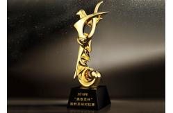China Poly Resin Material Award Cups Trophies With Abstract Figure Design supplier