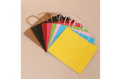 China Custom Logo Printing Reusable Kraft Paper Gift Packaging Bag With Handle supplier