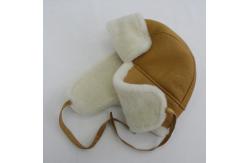 China Real fur lined trapper hats genuine leather trapper sheepskin shearling hat supplier