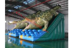China inflatable slip n slide giant dinasour inflatable with slide inflatable bouncy castle supplier