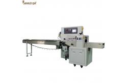 China Pillow Bag Bread Biscuit Candy Soap Packing Machine Chocolate Spoon Honey Filling Machine supplier