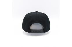 China 100% Cotton Flat Visor Snapback Hats Rubber Patch Black Constructed Cap supplier