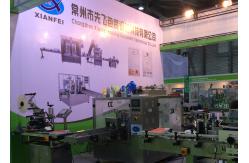 China Weighing Volumetric Piston Filling Machine SUS304 Oil Bottle Packing Machine supplier