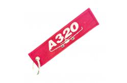 China Custom A320 Aircraft Keychain – Double-Stitched Polyester Fabric + Rust-Free Metal Hardware supplier