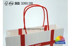 China Personalized Recyclable White Custom Paper Shopping Bags With Red Rope Handle​ supplier