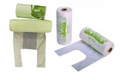 China PLA 50mic Biodegradable And Compostable Bags With T Shirt Handle supplier
